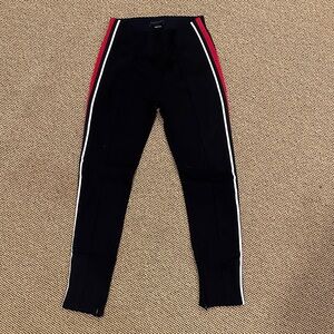 Sanctuary black pant with Red and White Stripes and seam in front